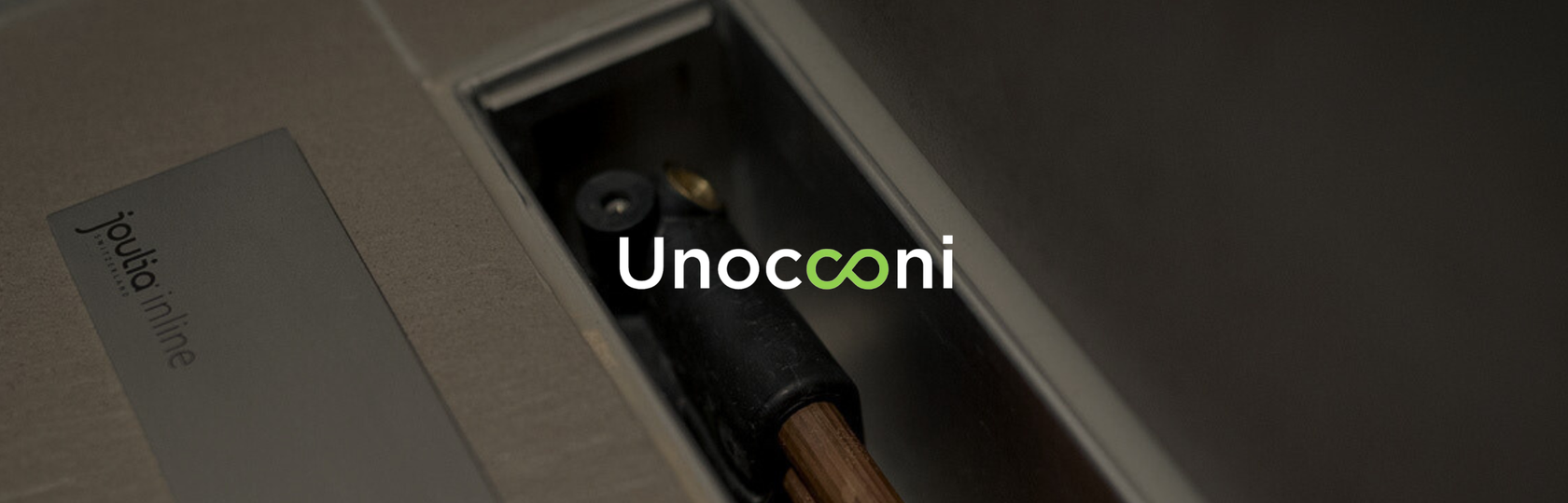 Unocconi Logo auf Duschrinne mit Wärmerückgewinnung im Badezimmer